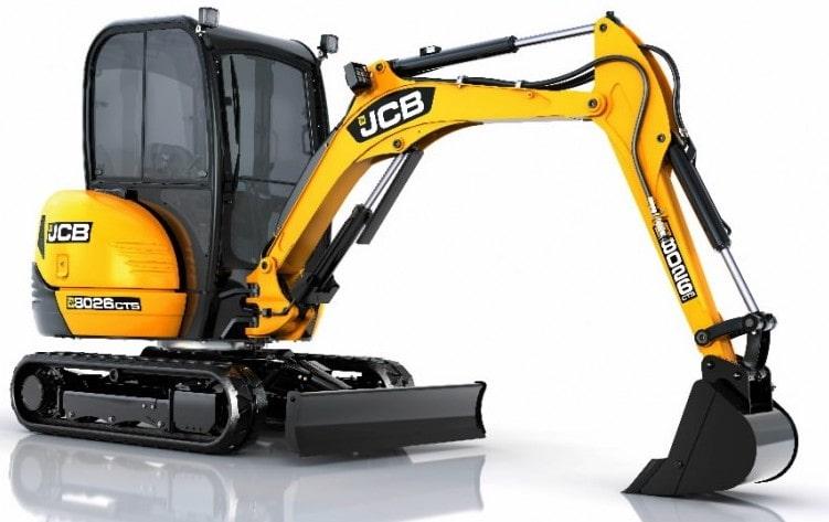 A 1 ton mini excavator rental Dubai unit working on a green lawn, showing no deep ruts or damage to the grass thanks to low ground pressure.