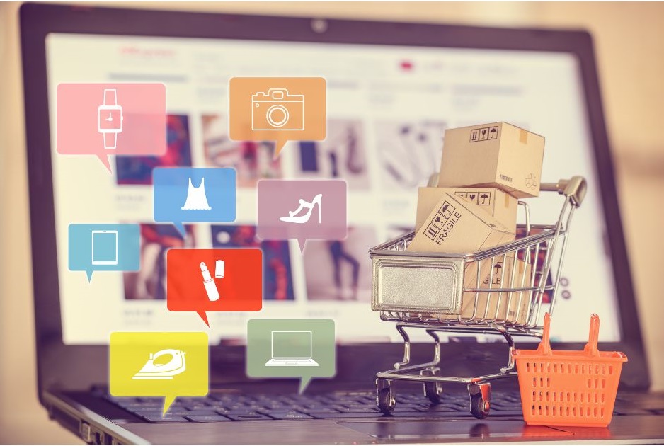 Image showing laptop screen with a small shopping cart and several boxes and designs of products customers can buy