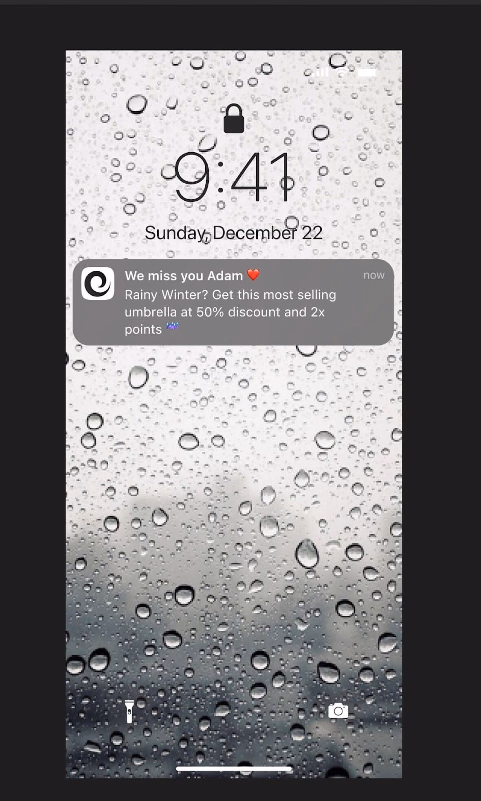 Phone lock screen with rain water background and notification that "We miss you Adam."
