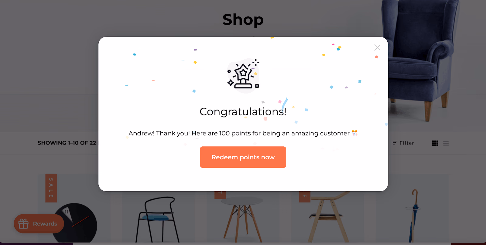 Website pop-up congratulates a customer with 100 points to redeem, with colorful confetti accents.