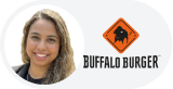 Woman with warm smile beside Buffalo Burger logo in a circular frame.