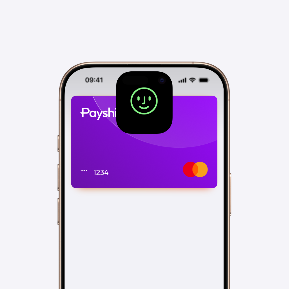 Un iPhone affichant une carte bancaire virtuelle Payshift avec une icône Mastercard et un visage vert souriant indiquant l'authentification Face ID.