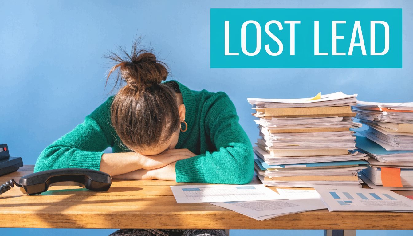 A woman rests her head on a desk piled high with paperwork, signifying a lost lead.