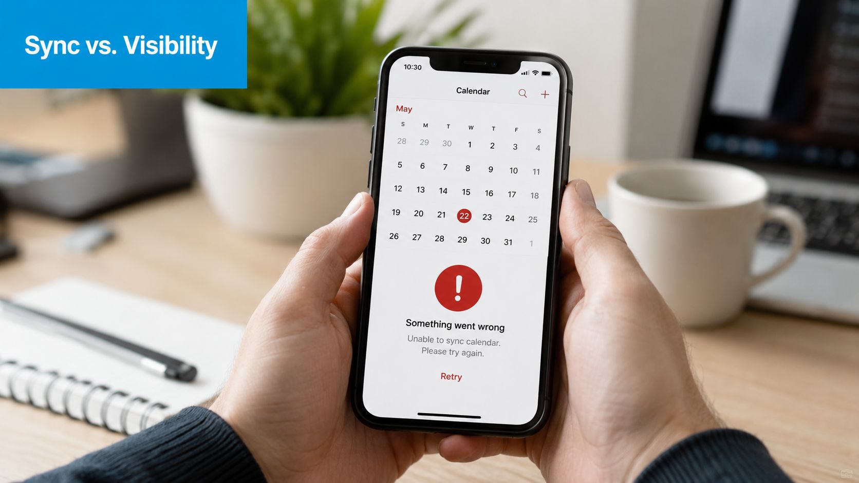 A person holding a smartphone showing an error message regarding a calendar sync failure.