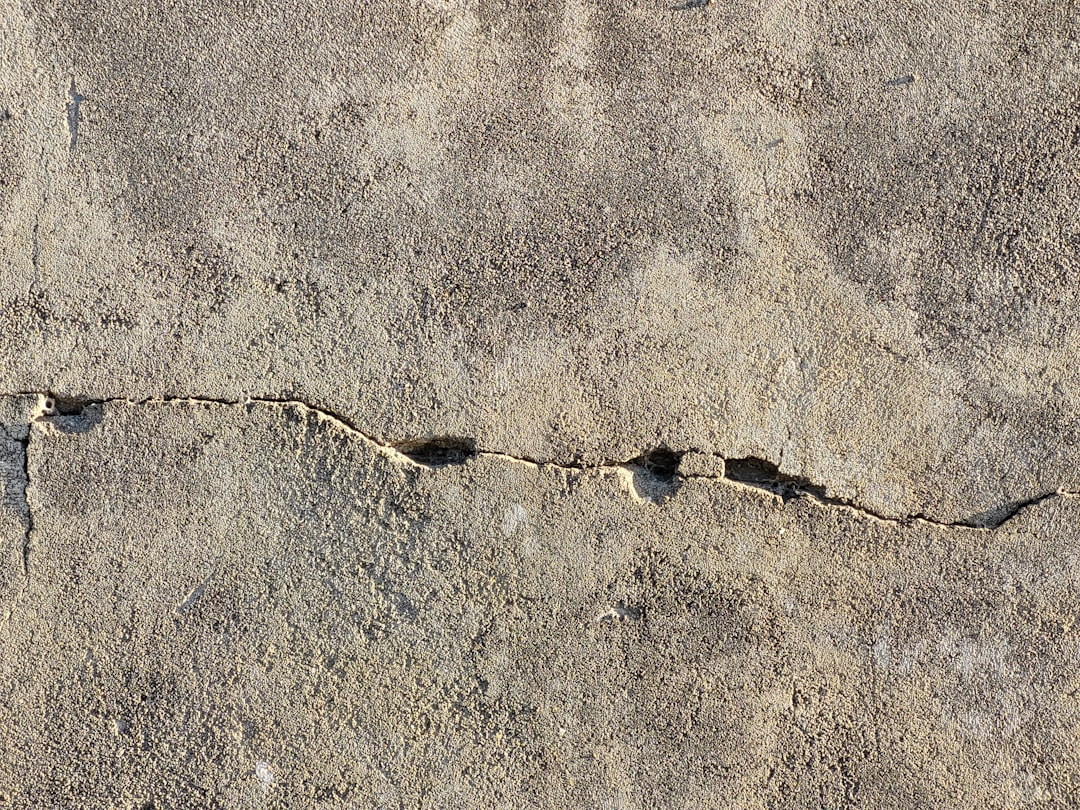 concrete spalling and exposed rebar - concrete roof leakage solution
