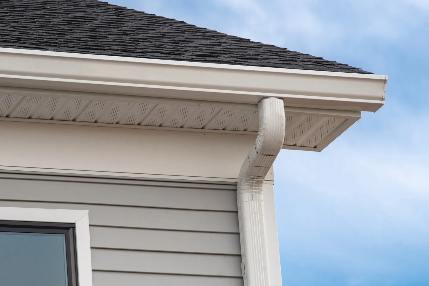 ridge vents and soffit intake vents on a roof deck