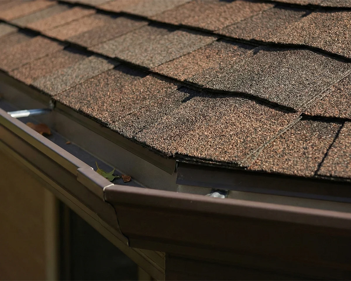 damaged roof shingles with granule loss in gutters damaged roof shingles with granule loss in gutters