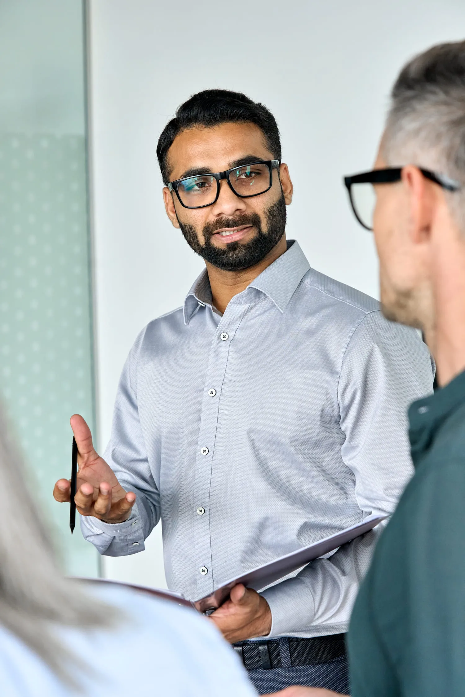 Two Nimbus Library founders in a minimalist office, showcasing the professional and versatile use of the library.