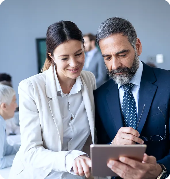 Two Nimbus Library founders in a minimalist office, showcasing the professional and versatile use of the library.