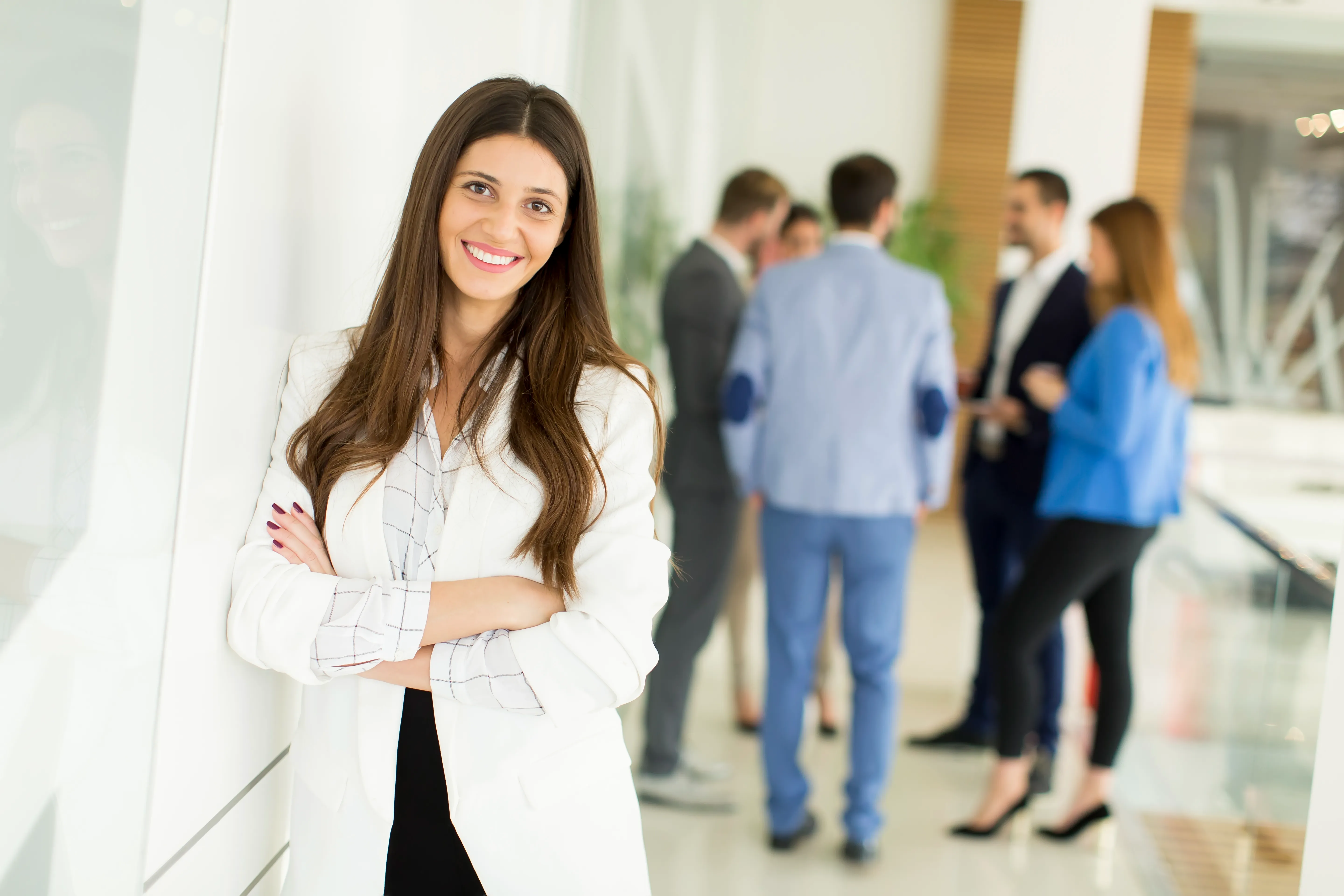 A modern, open-concept workspace filled with natural light and greenery, reflecting the clean and organized design of Nimbus Library.