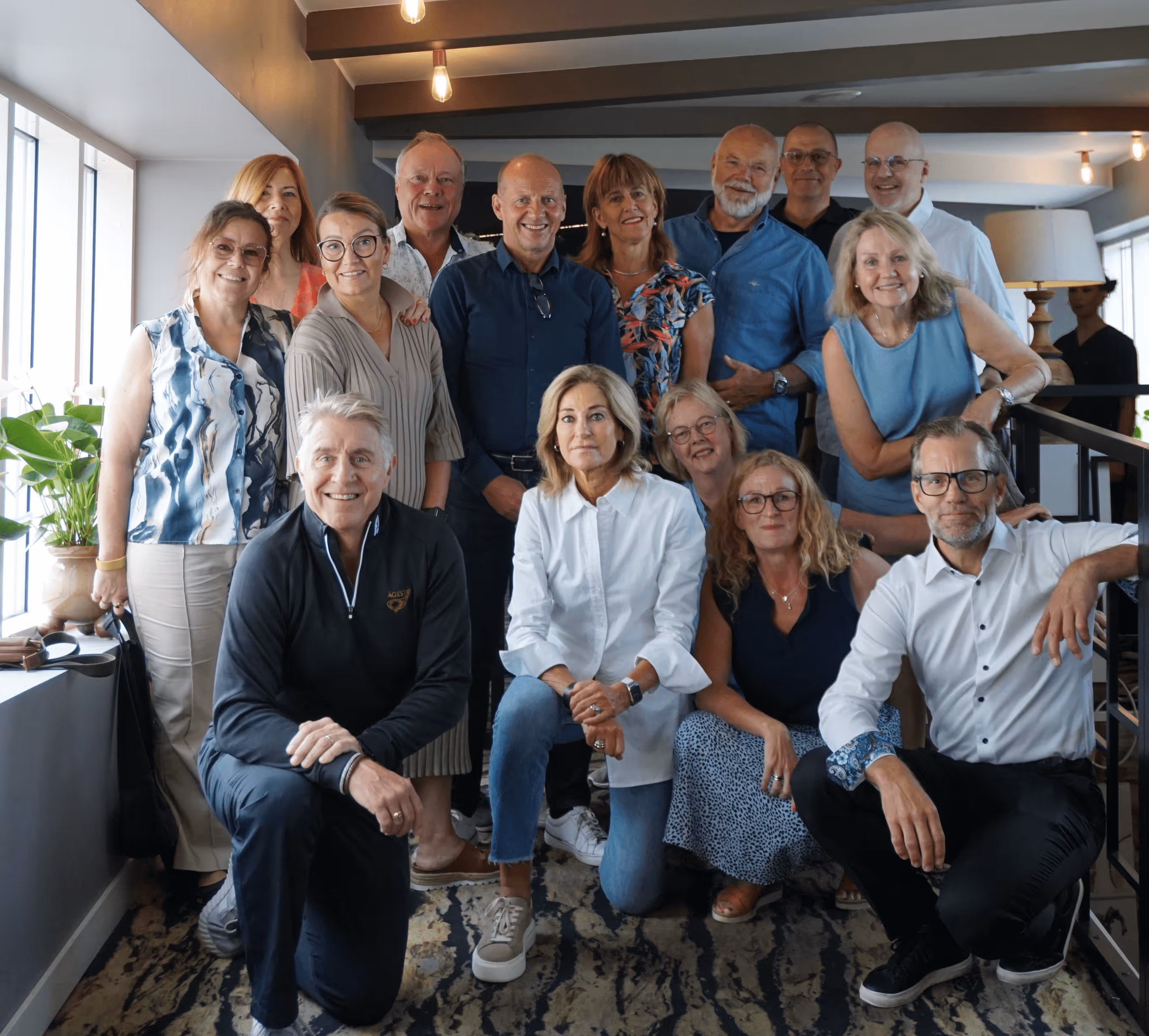 A image of the whole Leadership team smiling at the camera