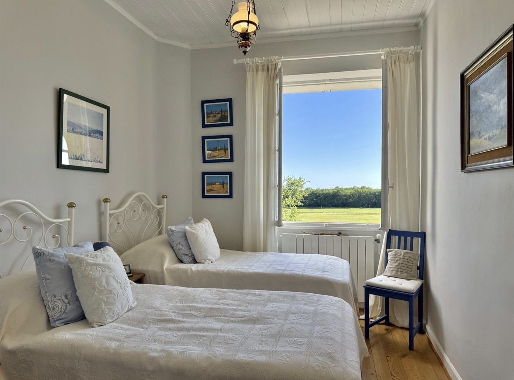 A man sitting in the room in old romantic cottage