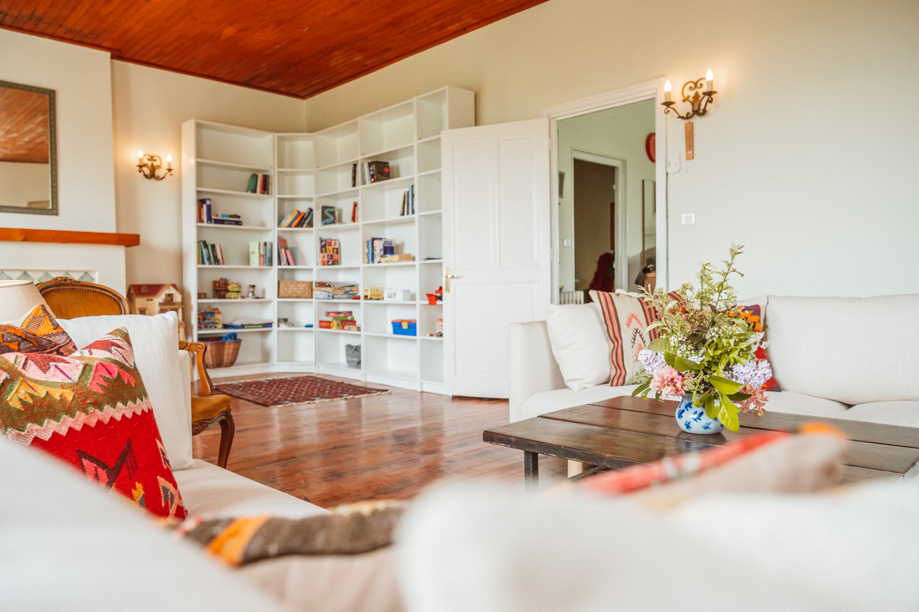 A man sitting in the room in old romantic cottage