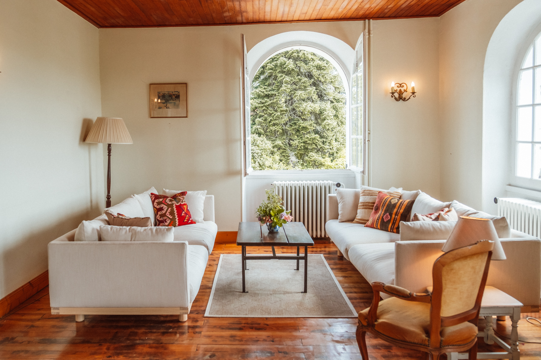 A man sitting in the room in old romantic cottage