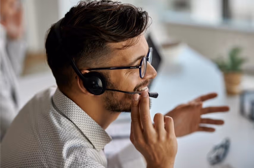 A man wearing headphone and talking