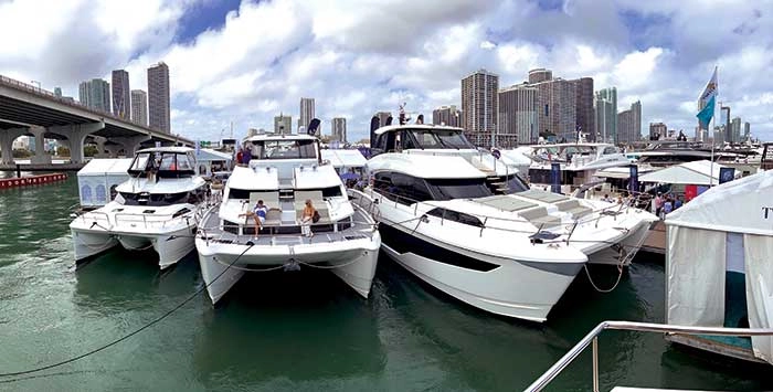 Wide deck of a power catamaran at anchor
