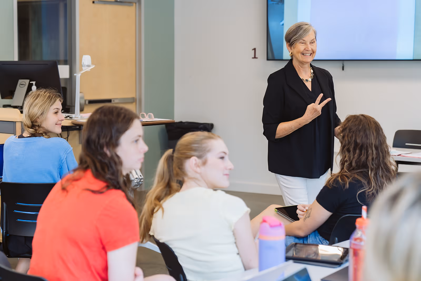 image of open book with pen