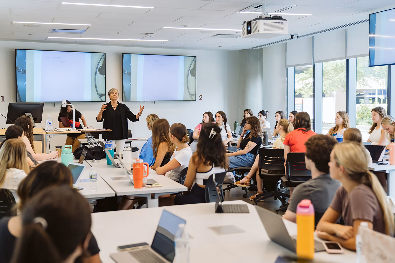 image of a person giving a presentation