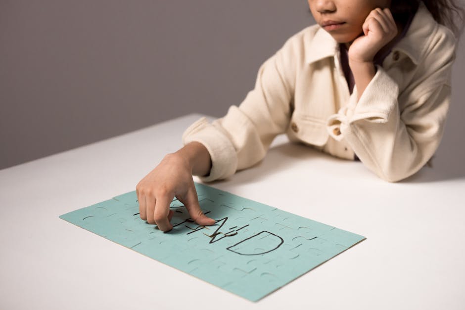a child calmly doing a puzzle - adhd mood swings