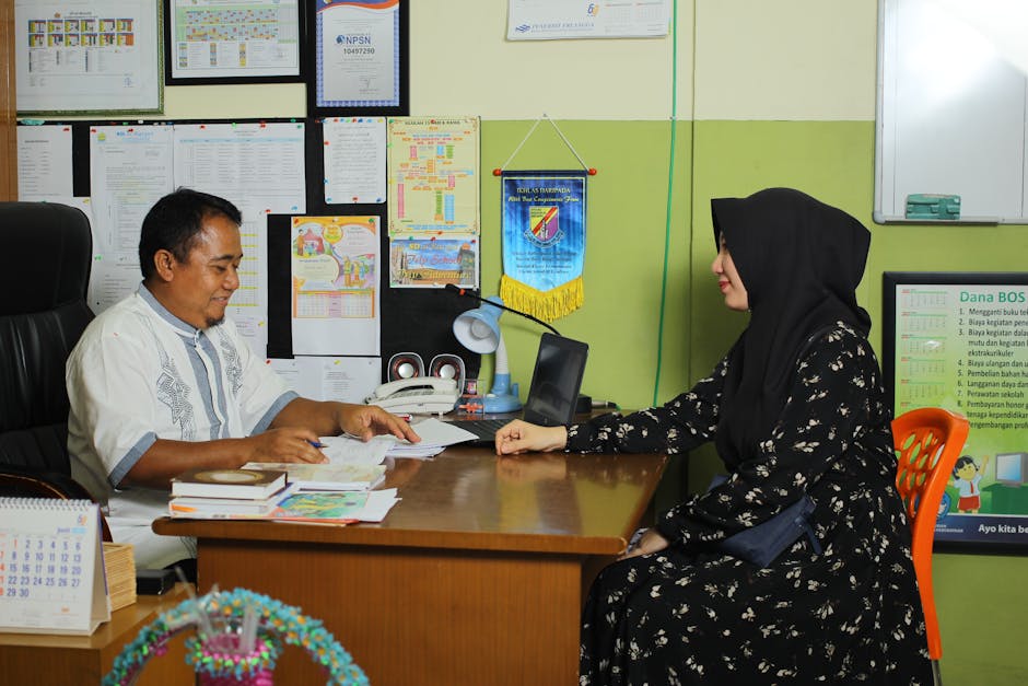 parent and teacher having a positive meeting - ADHD coping mechanisms kids