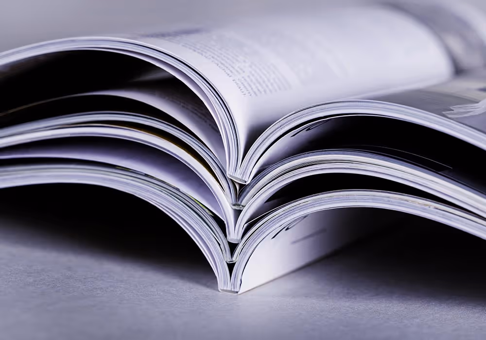 Three perfect binding booklets, printed at an affordable cost