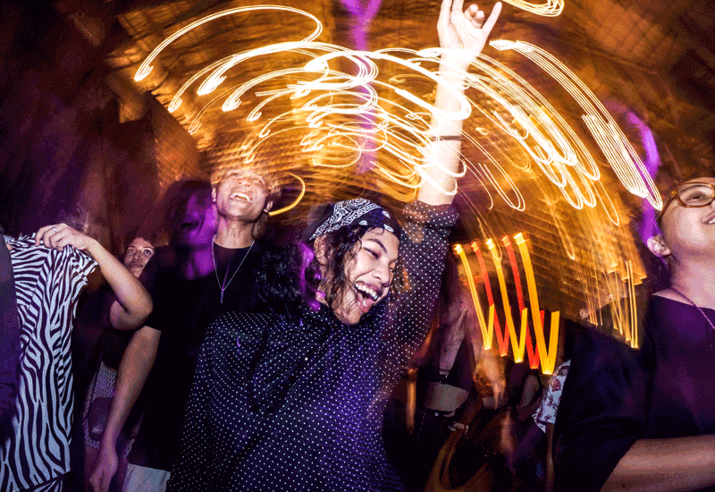 ChatGPT said:  A photo of energetic guests dancing under vibrant lights at a music event, captured by Silver Star Pro — featuring dynamic event photography and videography in Dubai that highlights nightlife energy and motion effects.