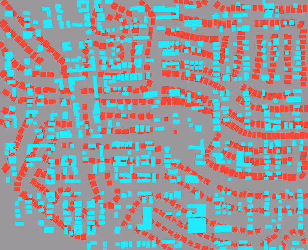 Aerial-style digital map showing a neighborhood layout with red and cyan colored buildings on a gray background.