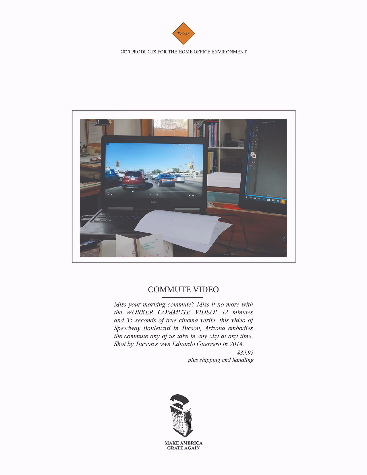 Two computer screens on a desk showing a video of a busy street with cars stopped at a traffic light.