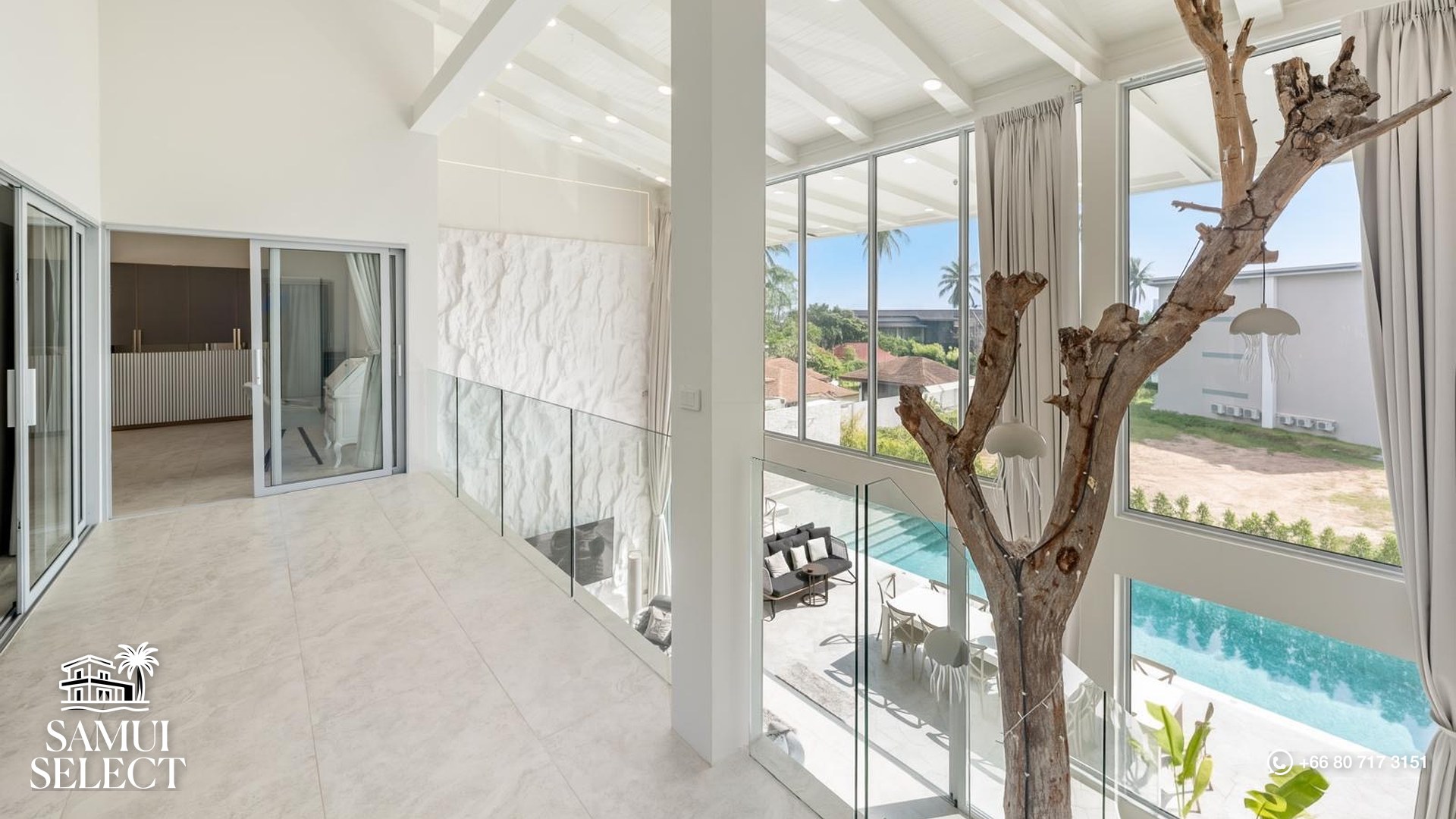 Bright interior with floor-to-ceiling windows
