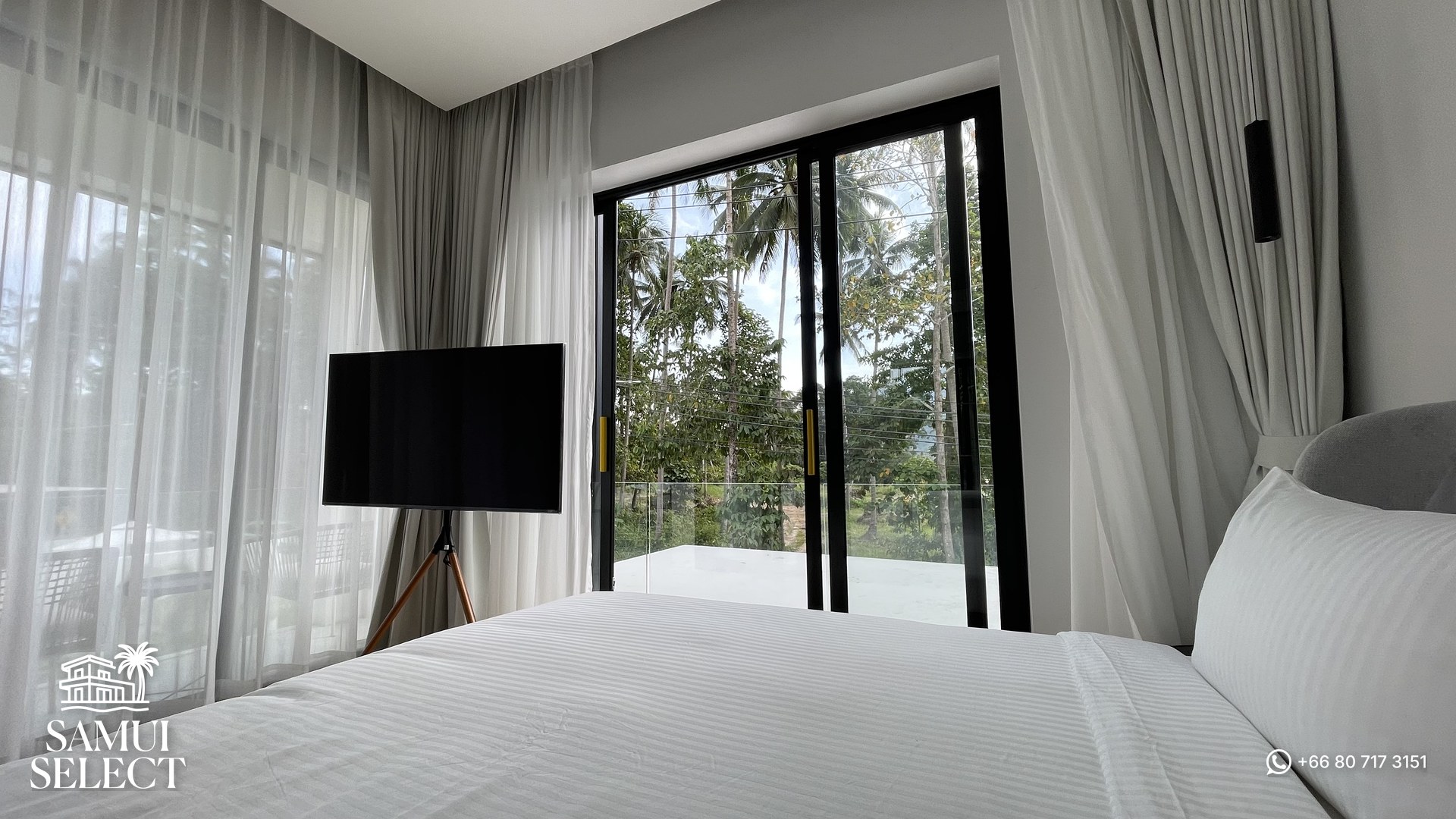 Bedroom with TV and garden view
