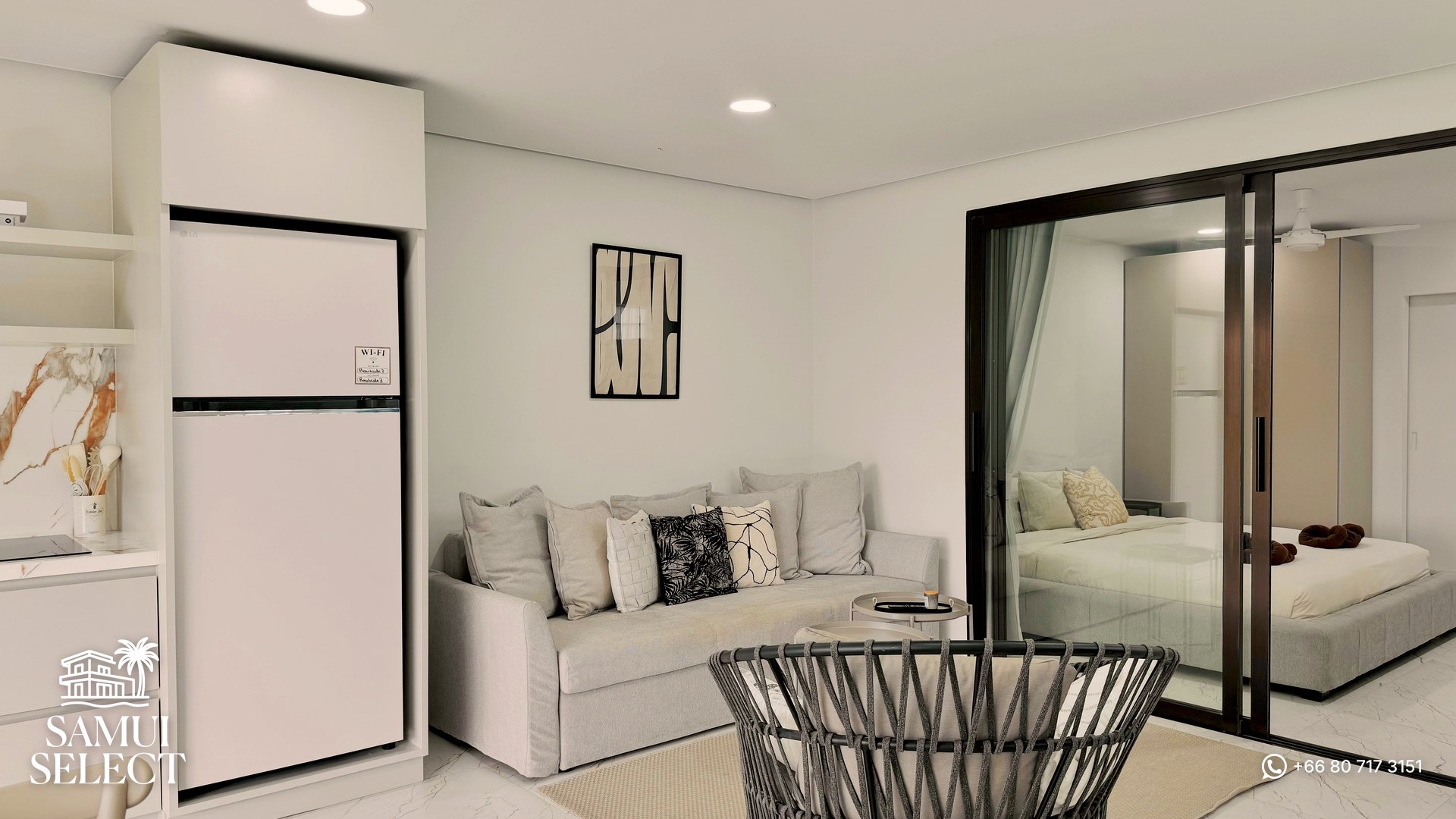 Living room with view into the bedroom
