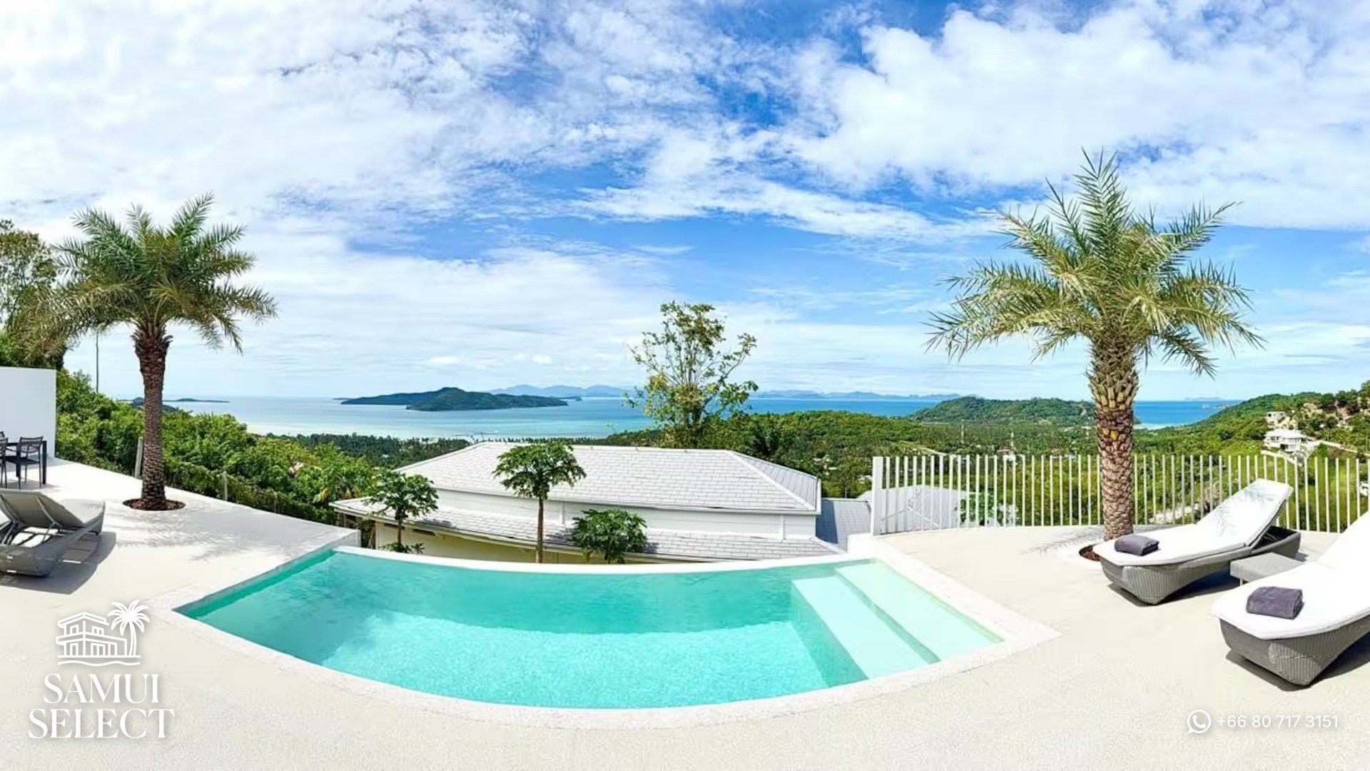 Pool terrace with palm trees and sea view