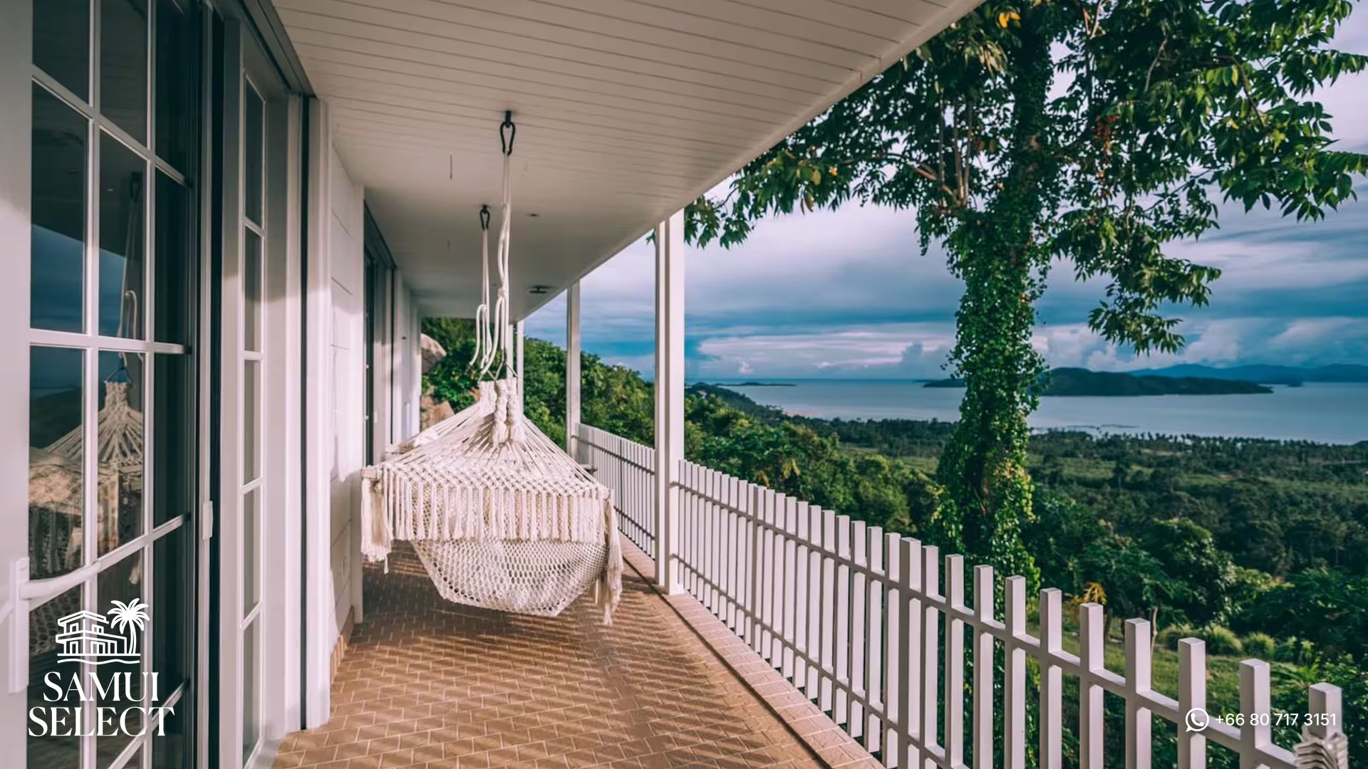 Terrace with hanging chair and sea view