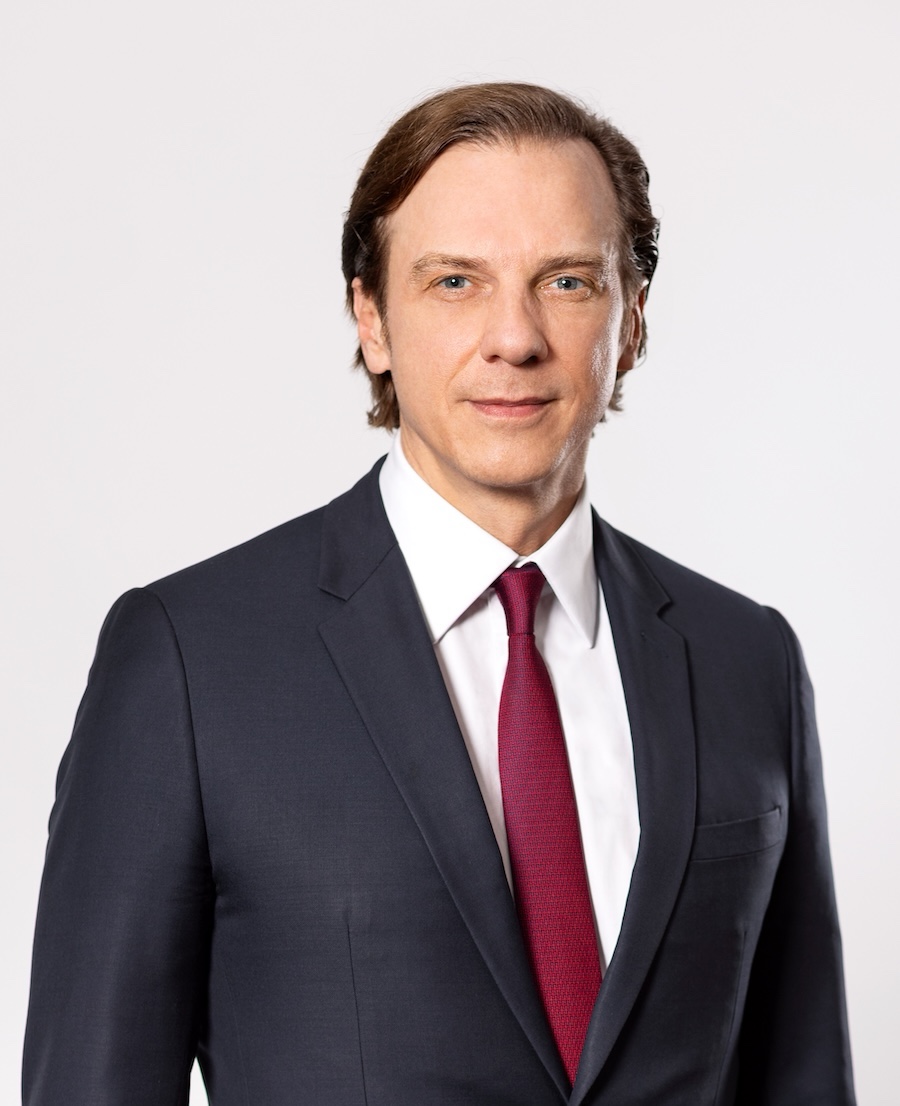 Stephan Büttner, CEO of AGRANA Beteiligungs-AG, in a dark suit with red tie [no AI]
