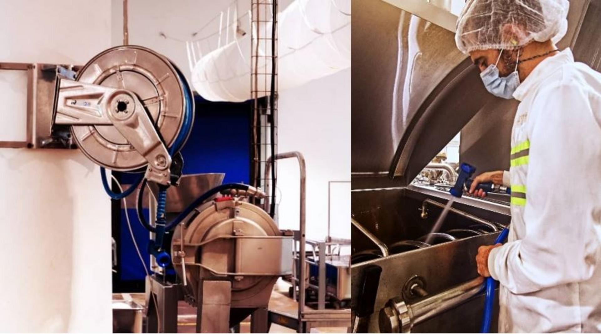 AGRANA Fruit plant in Algeria: processing machinery and an employee in protective clothing cleaning a tank