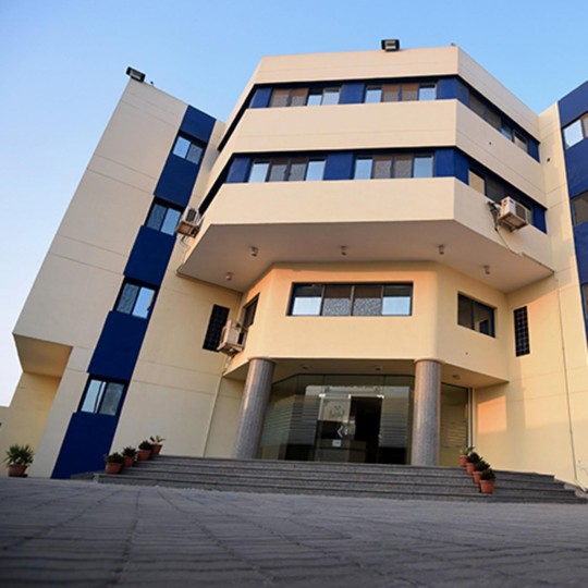 Office building of the AGRANA Fruit site in Egypt with blue and beige facade