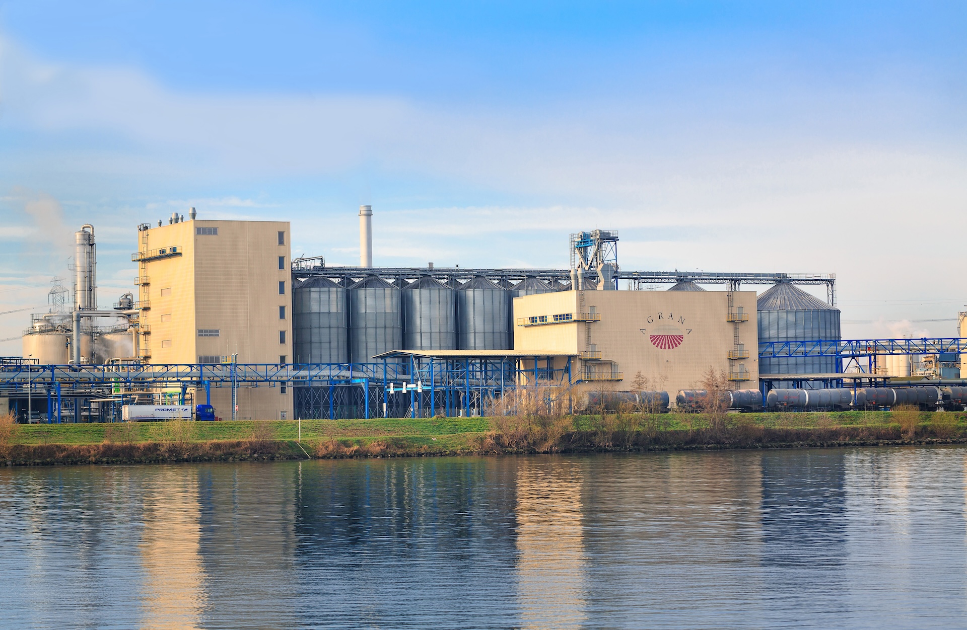 AGRANA plant in Pischelsdorf, Austria, with silos seen from across the Danube [no AI]