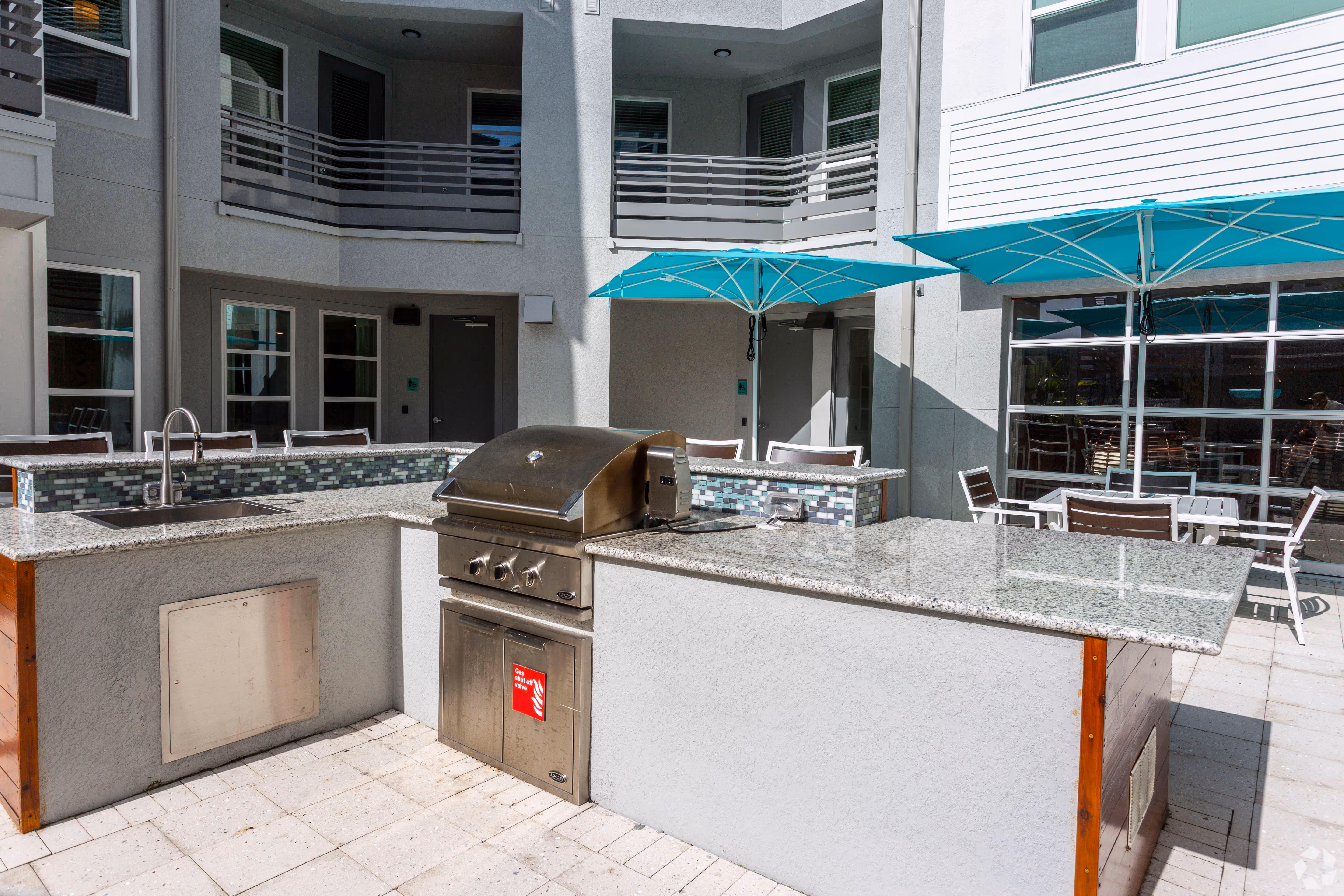 BBQ Area with umbrellas and grills
