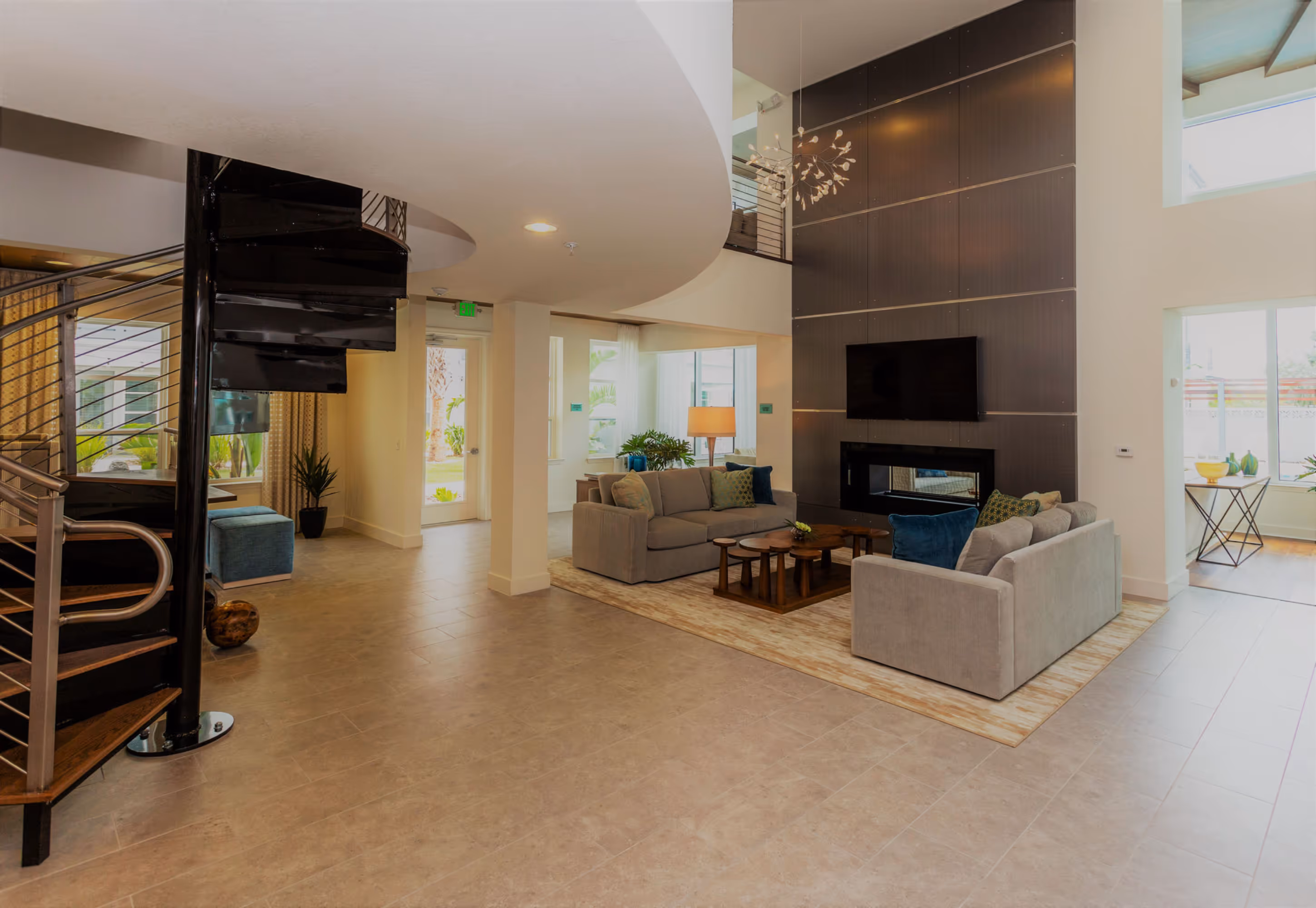 clubhouse seating area with tvs