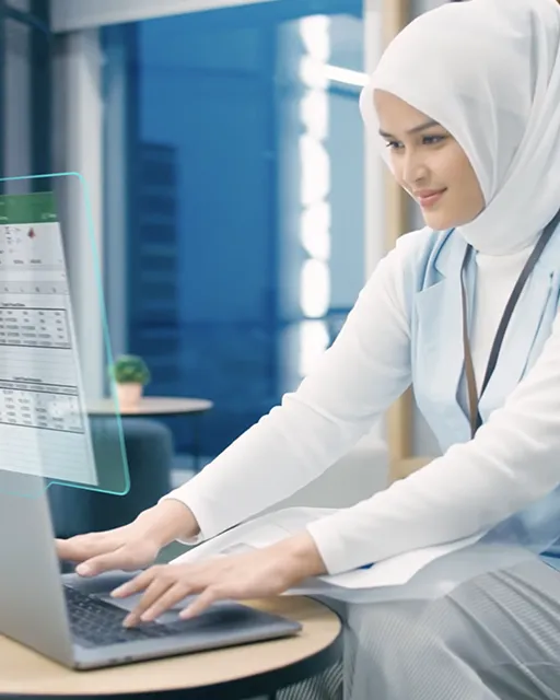 A laptop sitting on top of a group of teeth.