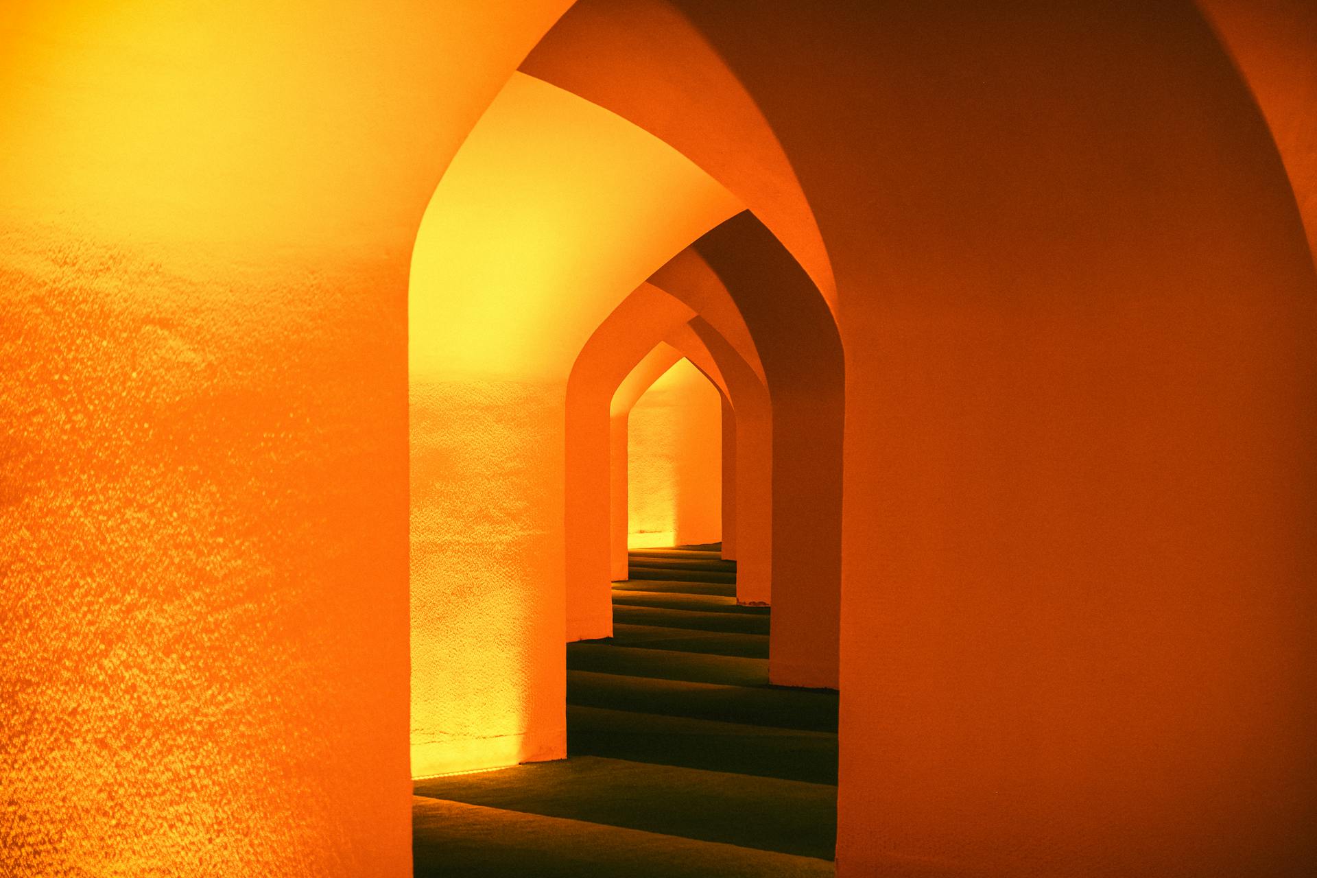 A woman sitting on top of an inflatable mattress.