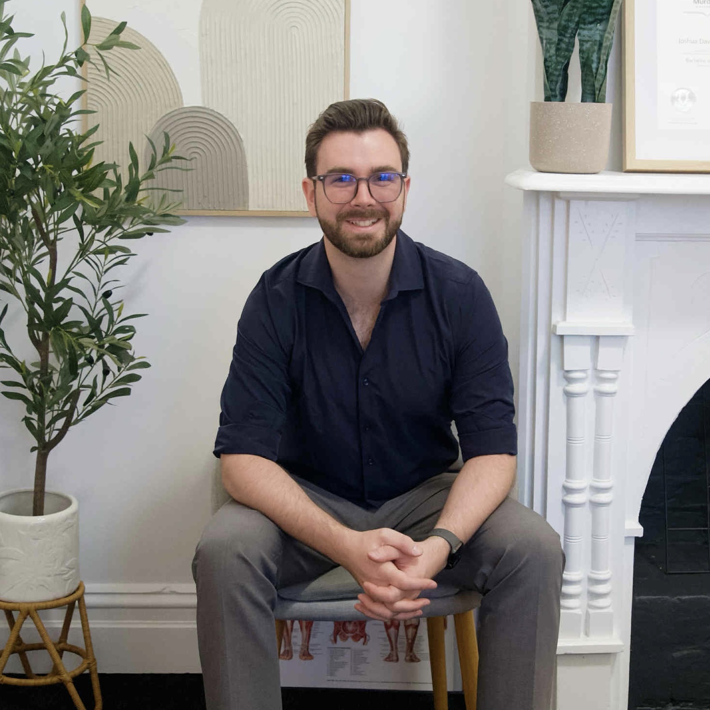 Dr Josh Walker chiropractor posing for a photo