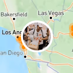 Map showing parts of California and Nevada with a circular inset of people working together on a project.