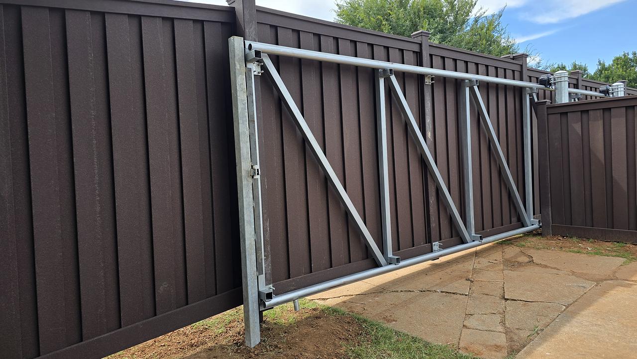 Composite Fence Design by Tiller Fence and Deck