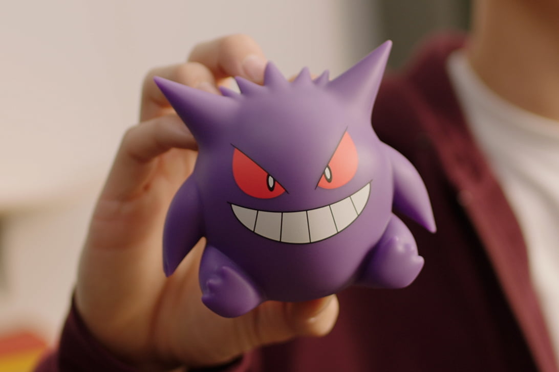 Gengar Pokémon vinyl figure held in hand in a collectible toy close-up scene