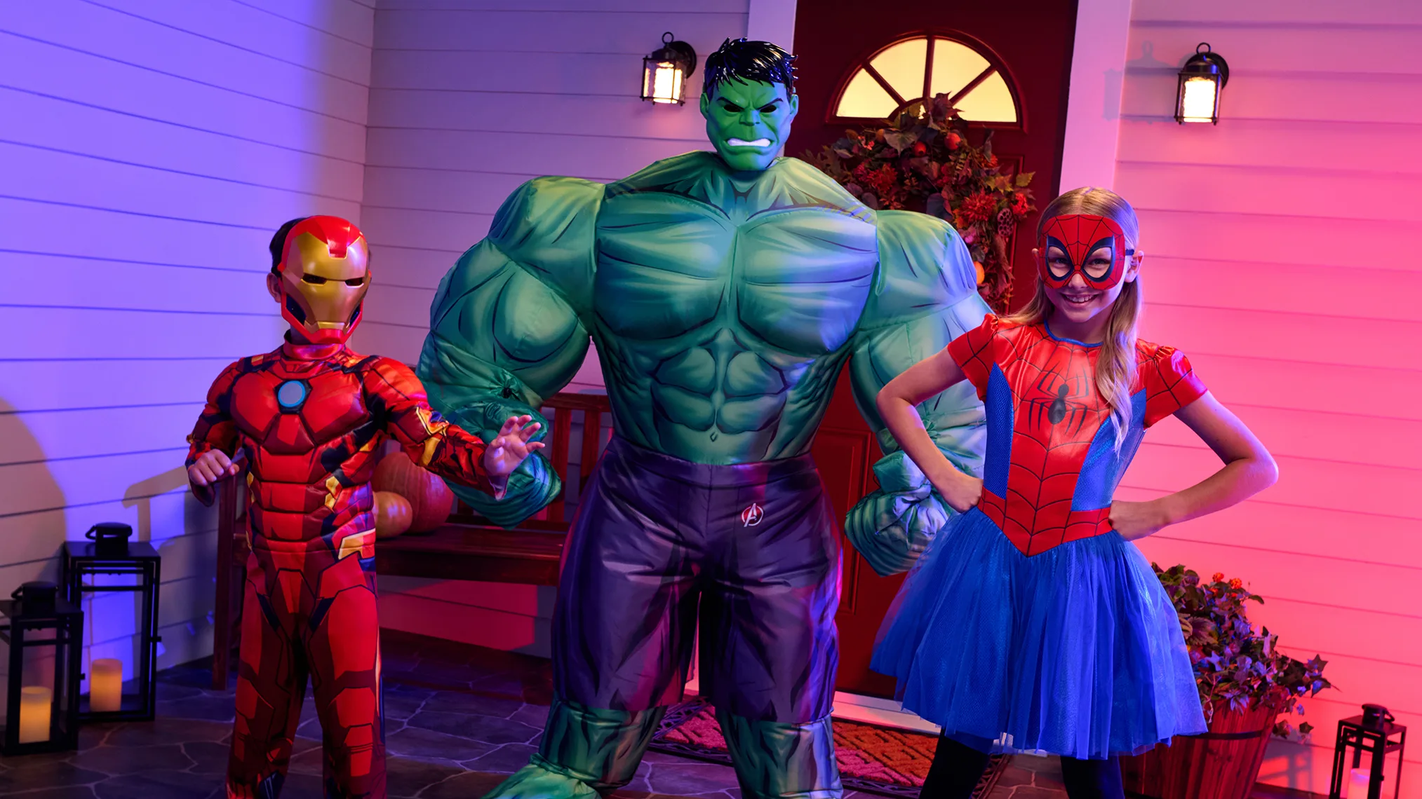 Children dressed as Marvel superheroes including Iron Man, Hulk, and Spider-Girl
