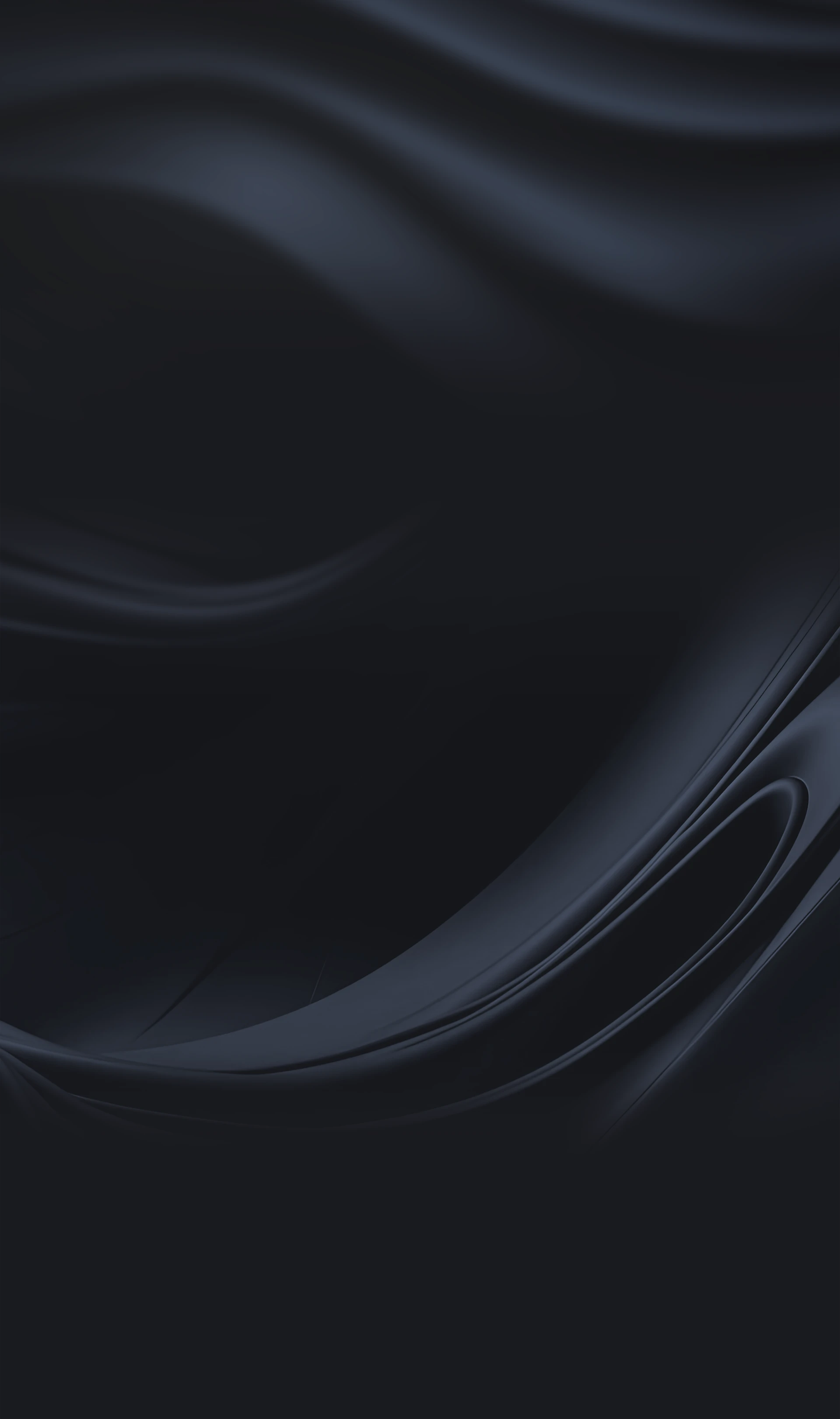 Abstract smooth dark flowing silk fabric with subtle highlights.