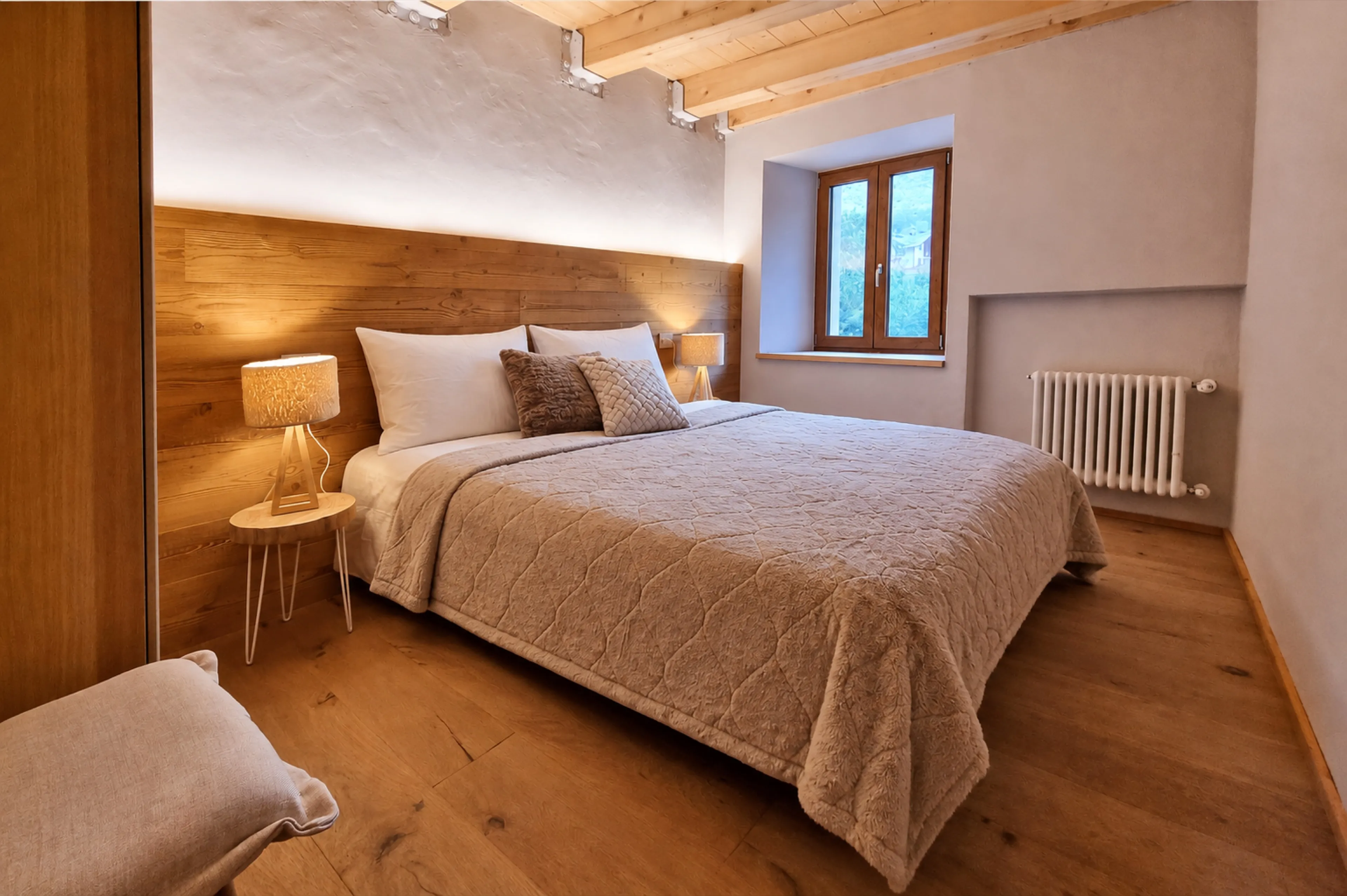 Gemütliches Schlafzimmer in einer von Imoreo betreuten Ferienwohnung in Courmayeur