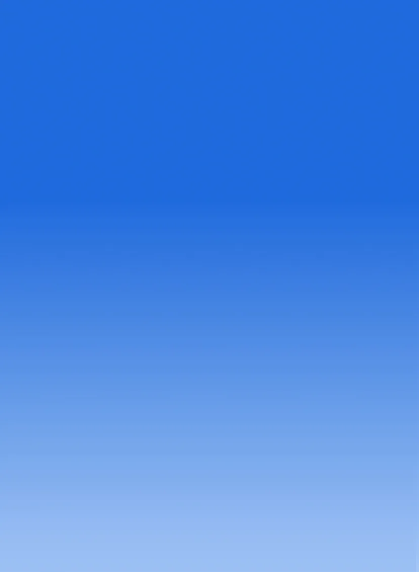 Clear blue sky with a smooth gradient from deep to light blue.