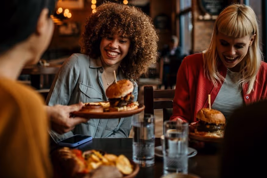 Two women eating at a restaurant